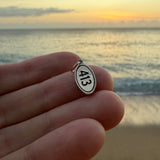 413 Oval Road Sign Charm