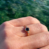 Oval Blue Sapphire and Diamond Bezel Ring